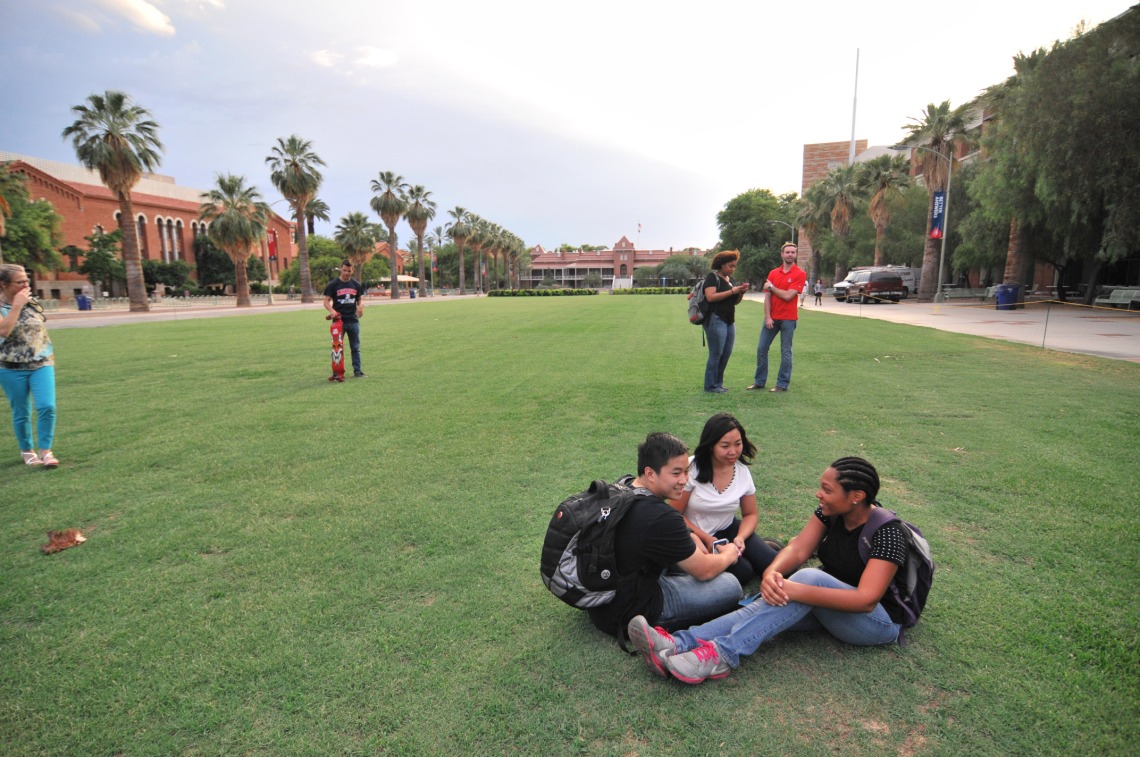 students hanging out on the UA mall